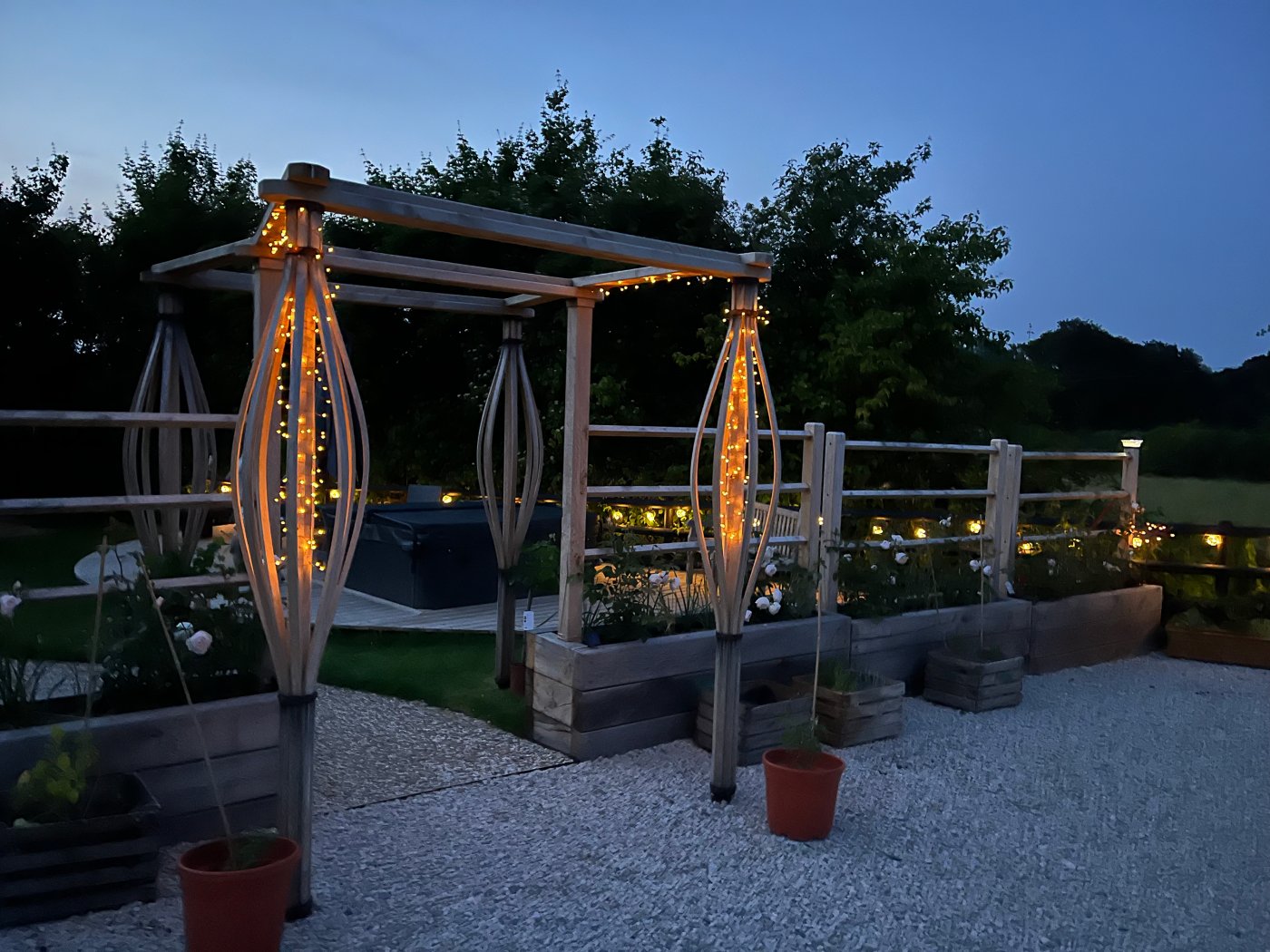 Shepherds Hut at night, lights surrounding hut twinkling, beautiful